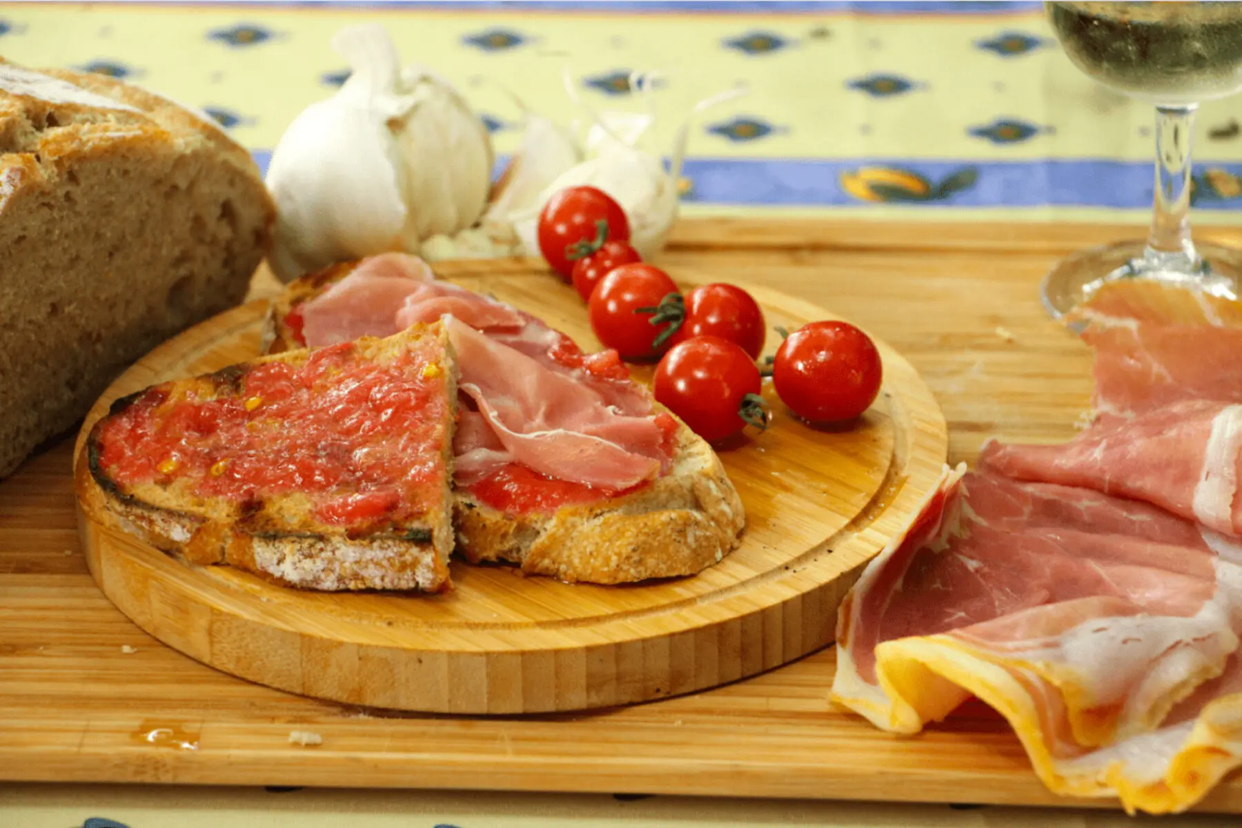 Wood fired pan con tomate on grilled country bread with olive oil and fleur de sel